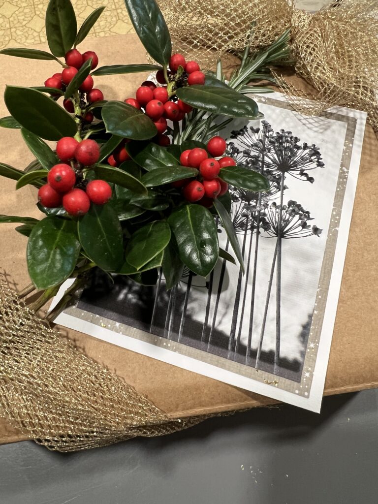 Heirloom holly with berries (safe for fingers!) and fresh Rosemary sprig garnished box, wrapped with an elegant gold mesh bow